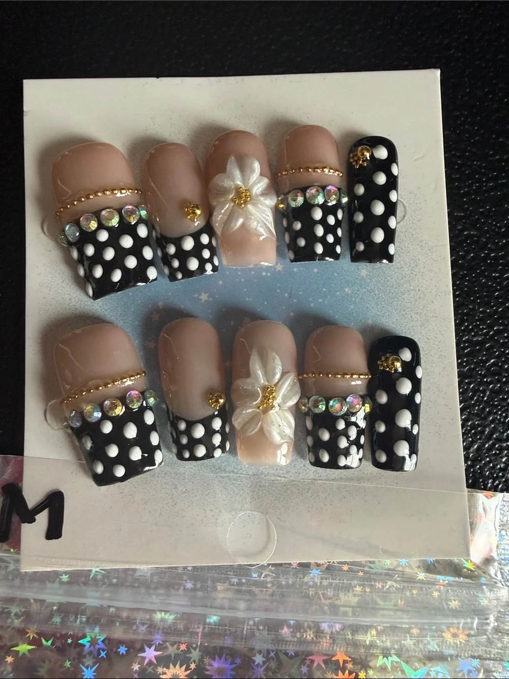 Black Polka Dot Press-On Nails with Nude Base and 3D Flower Accent